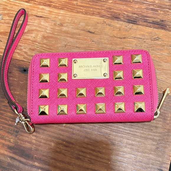 Michael Kors Handbags - Michael Kors Fuchsia Wristlet with Gold Studs
